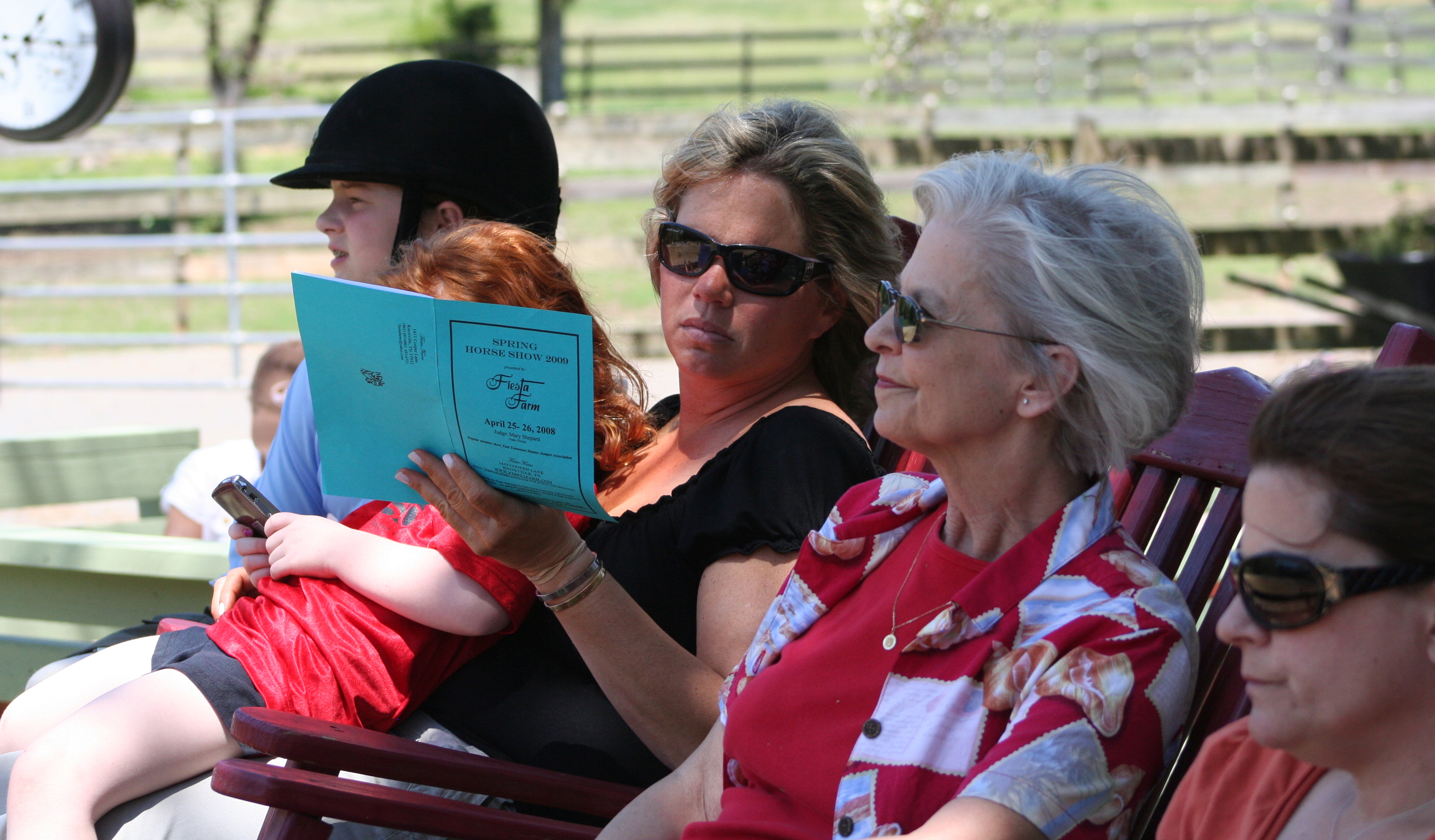 Rocking chairs on the deck at a Fiesta Farm horse show.